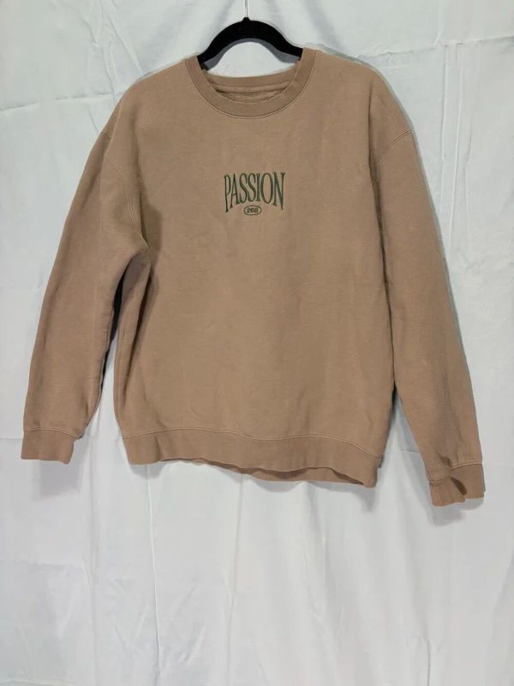 Passion 268 beige crew neck with green lettering